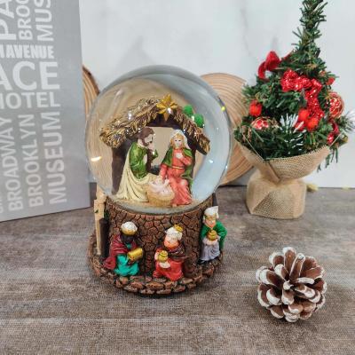 China Promotion Giftts Family Nativity Scene Snow Globe Holy Home Ornament Music Box Resin Craft for sale