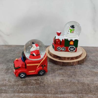 China Promotion Giftts Magma Jumper Carry Snow Globe Chrsitmas Ornament Decoration Resin Craft for sale