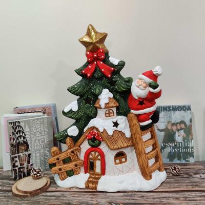 China Modern Candlestick Christmas Decoration Santa House Candle Holder Christmas Decor Statue for sale