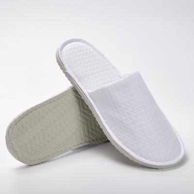 China Wholesale Custom Non-Slip Bathroom Hotel Spa Disposable Unique EVA Waffle White Slippers for Guests for sale