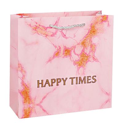 China Recyclable High Quality Custom Logos Paper Bags Gift Bag Patterns And Shopping Bag for sale