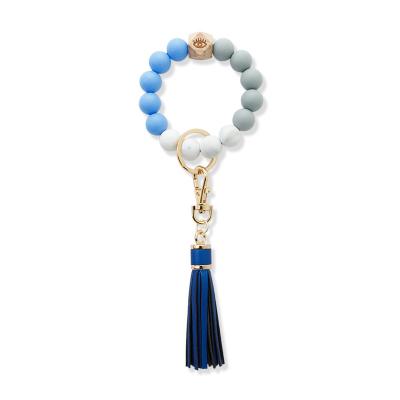 China Wholesale Environmentally Friendly Colorful Wooden Round Beads Embellished Keychain Cow Tassel Keychain Bracelet Keychain Pendant Beaded Bracelets For Women Key Chain Charms for sale