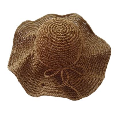 China Large Checked Brim Crocheted Sun Hats Crochet Straw Hat With Bow For Women Cloche Paper Material Hat for sale