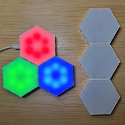 China Multicolor Smart Touch Wall Lamp Hexagonal Modular Living Room Led Light Panels for sale