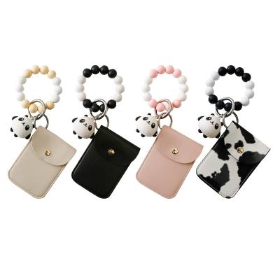 China Bags Cute Panda Beaded Card Holder Wristband Card Holder Cute Panda Chain Wristband Silicone Card Holder PU Card Bag Beaded Main Portable Leather Wristband for sale