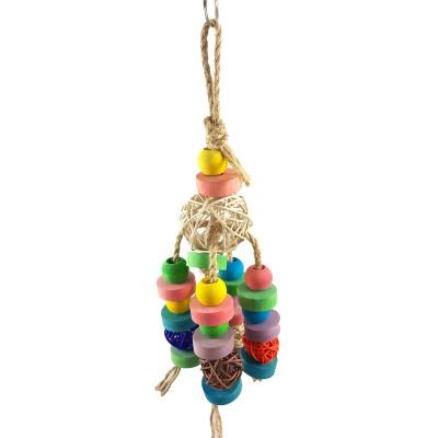 China Colorful Wooden Rattan Stocked Around Ball Parrot Bird Toys Wooden Tassel For Bird Biting for sale