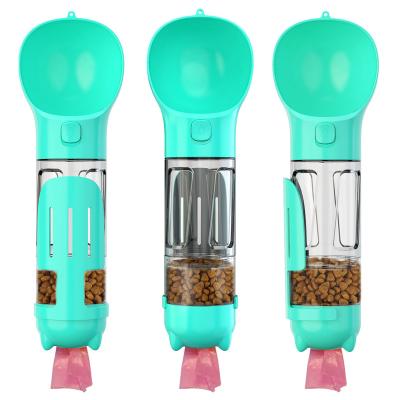 China Viable 4 in 1 Portable Dog Water Bottle Outdoor Travel Pet Water Food Dispenser with Poop Bag and Scoop for sale