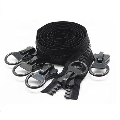 China #20 Long Lasting Plastic Zipper Chain Through Roll With Non Lock Slider Ring Puller for sale