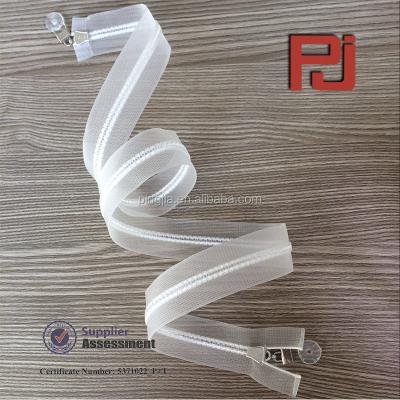 China #5 Teeth Plastic Resin Sustainable Separating Two Way Transparent Zipper With Rubber Puller for sale