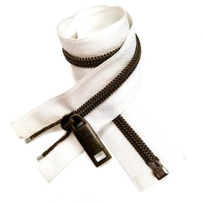 China Durable Matte Antique Brass Nylon Teeth 501 White Zipper Tape For Down Coat for sale