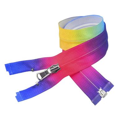 China Sustainable Custom Style #5 Tape Silk Printed Nylon Coil Zipper Flipped Open End for sale