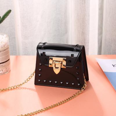 China Hot Selling 2022 Fashion New Design Mini Rivet Shoulder Jelly Ladies Purses Small Tote Bag Kids Cute Handbags Women for sale