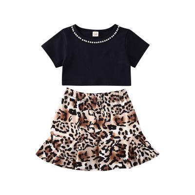 China 2021 1888 New Hip Kids Casual Toddler Summer Short Sleeve Pearl Sleeve Leopard T-shirt Skirt Girls Clothes Set for sale