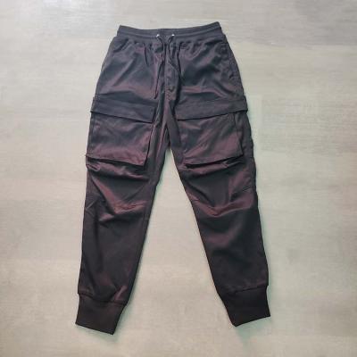 China Custom 100% spring design anti-pilling spring design cargo rope casual pants factory and autumn multi-pocket cotton for sale