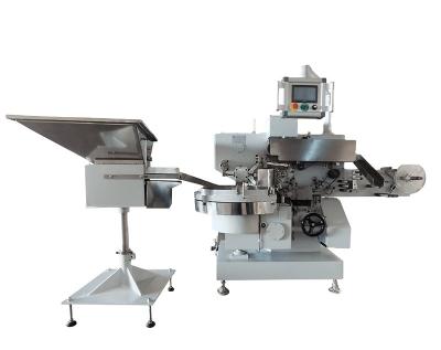 China Eco - Friendly Hot Selling Authentic Foil Wrapping Machinery For Egg Chocolate / Pralines / Compressed Candy for sale