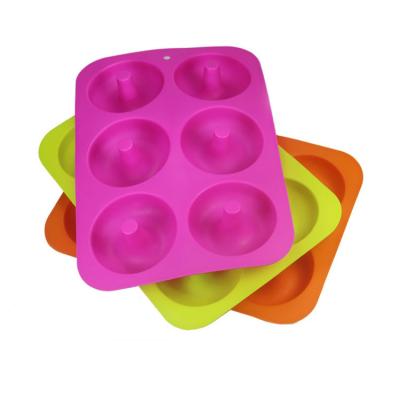 China 6 Cavities Disposable Non-Stick Chocolate Cake Making Pan Tools Silicone Donut Mold Bake for sale