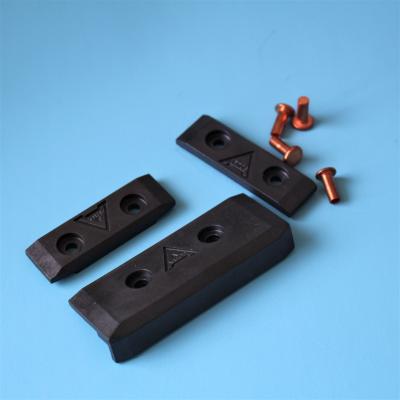 China Artos Finishing Stenter Machine Parts Peek Sliding Pads Sets Copper Rivet Carbon Fiber Material for sale