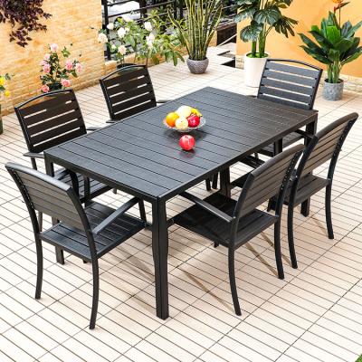 China Good Design Morden Garden Style Outdoor Dining Tables And Chairs Set Black Plastic Wood Restaurant Furniture for sale