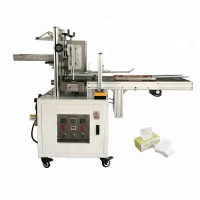 China Low cost and easy to operate high quality semi automatic facial tissue paper carton box packing machine for sale