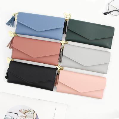 China Waterproof Zippered Leather Coin Pocket Change PU Fabric Tassel Designer Wallets Ladies Wallets and Purses for Women for sale