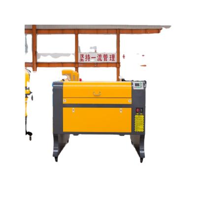 China Hot sale water cooled 1390 CO2 laser engrave cutter 1390 laser cutting machine/clothing machine/laser for leather and acrylic for sale