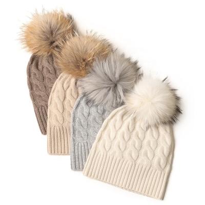 China COMMON cheap winter hat women smudge fur pom pom cable knit soft cashmere beanie hats custom luxury fashion ny logo for sale