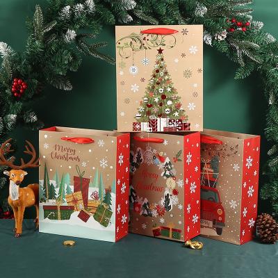 China Christmas Recyclable Wholesale Gift Cardboard Paper Bag With Ribbon Handle Clothing Paper Handbag Packaging Hot Stamping Printing Accept for sale