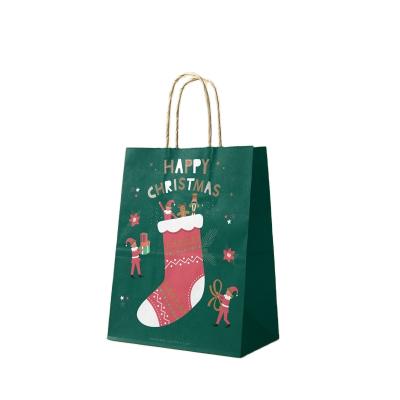 China Wholesale Recyclable Christmas Gift Bag With Handle Printing Green Color Sock Paper Bags Accept Owen Custom Logo for sale