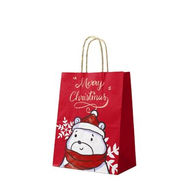 China Recyclable Wholesale Christmas Kraft Paper Gift Wrapping Shopping Bag With Handle Polar Bear Craft Paper Bags Accept Custom Made for sale