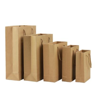 China Recyclable In Stock Recycle Environmental Custom Logo Blank Paper Craft Shopping Bag With Handle for sale