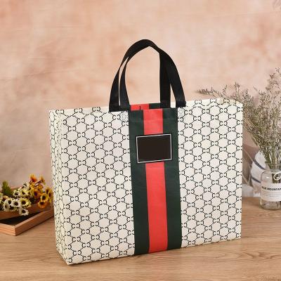 China Recyclable wholesale luxury boutique reusable non woven bags for clothing packaging eco friendly reuse shopping bag accept custom logo for sale