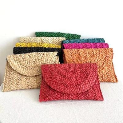 China Handmade Ladies Straw Clutch Beach Rattan Bag Summer Beach Straw Woven Women Handbags Waterproof for sale