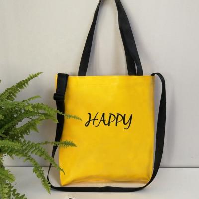 China Customized Logo PVC Handled Yellow Shopping Bag Customized Item Style Packing Pattern Food Promotion Gift Souvenir for sale