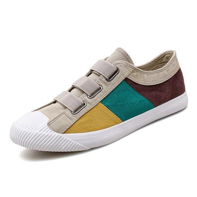 China Durable Men's Shoes Color Matching Elastic Band Vulcanized Toe Canvas Shoes Student Casual Sports Shoes for sale