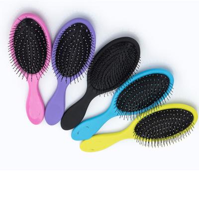 China Magic Home Airbag Comb Candy Handle Detangling Comb Shower Hair Brush Airbag Paddle Massager Hair Styling Tool for sale