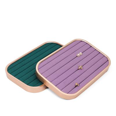 China Classic Elegant Luxury Stain Wholesale Jewelry Tray Jewelry Display Tray High Quality Metal Rounded Ring Earrings Storage Tray Store Use for sale