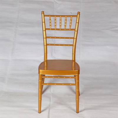 China Hotel Chair Stacking Aluminum Metal Chiavari Chair For Wedding With Cushions for sale