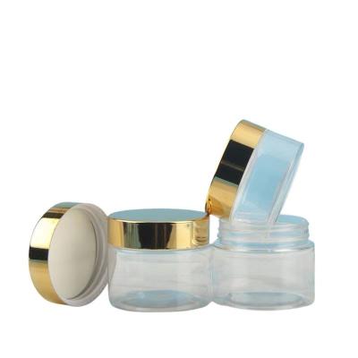 China 2023 New Product Round PET Plastic Cosmetic Container Transparent Cream Jar With Gold Cap for sale