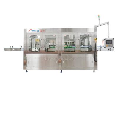 China Green Tea Milk Juice Filling Machine Process Through Poking Bottle Star-Wheel en venta