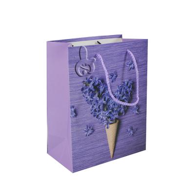 China 2022 Strong Recyclable Flower Pattern Cardboard Newsagent Bag Packaging Purple Flowers Lavender Gift Bag For Boutique Store Wholesale for sale