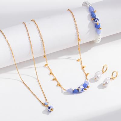 China Blue and white summer design environmental friendly jewelry set original gold chain china bracelet necklace copper earring for sale