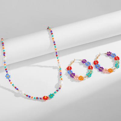 China Women Environmentally Friendly Bulk Summer Rice Bead Necklace Earring Set Colorful Bohemian Rice Seed Beaded Necklace Wholesale m for sale