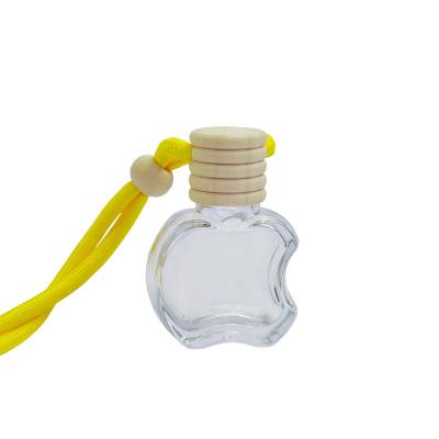 China Wholesale Car Perfume Bottle 10ml Apple Shape Color Essential Oil Glass Bottle Manufacturers Cosmetic Pendant Empty Pendant for sale