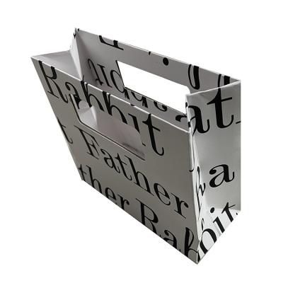 China Handle Fence Die Cut Paper Bag for sale