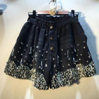 China New Viable Spring Denim Shorts Black Tassel Beads Rhinestones Denim Shorts High Waist Slimming Wide-Leg Denim Abbreviations Female for sale