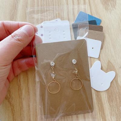 China Eco-friendly easy to clean Earring Cards and 50pcs Bags Necklace Earring Display Cards Self-Seal Bags Kraft Paper Card for DIY Jewelry Packaging for sale