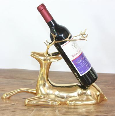 China Modern Minimalist Brass Deer Wine Rack Wine Cabinet China Home Furnishings Deer Crafts Model Hotel Club Decorations for sale