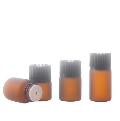 China 1ml 2ml 3ml essential oil glass cosmetic bottle with inner plug and screw cap for sale