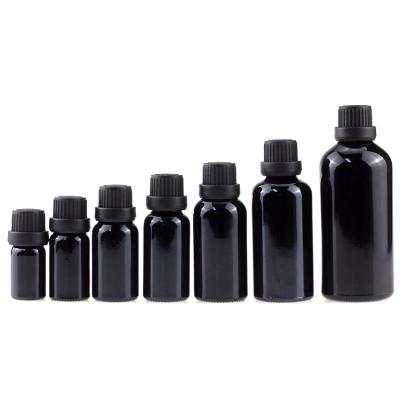 China 5ml Cosmetic 10ml 15ml 20ml 30ml 50ml Glossy/Glossy Black 100ml Essential Oil Glass Bottle With Black Tamper Proof Cap for sale