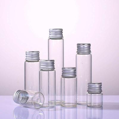 China 10ml 15ml 20ml 25ml 30ml 40ml 50ml 60ml Cosmetic Clear Jar Tubular Glass Clear Vial With Aluminum Screw Cap for sale